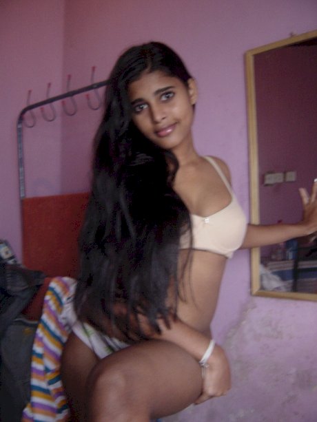 Indian solo girl fondles her large boobs after stripping to her panties