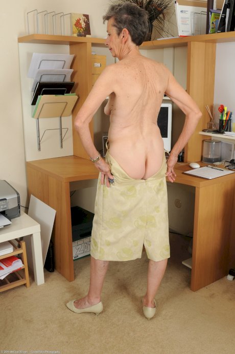 Granny secretary Cassie strips & shows off her fragile body completely nude 