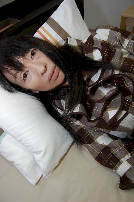 Ugly asian gal Yoshiko Nagasawa undressing and exposing her shaggy twat