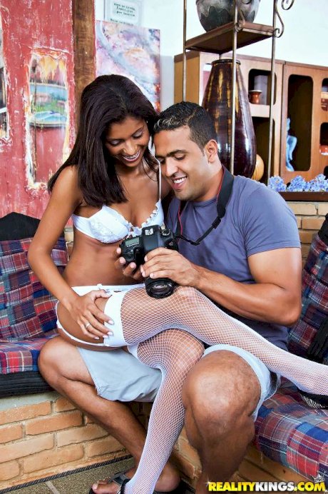 Hot latin teen in white stockings and lingerie fucks by a photographer