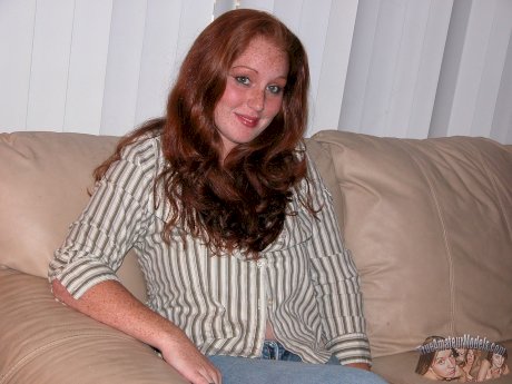 Freckled redhead with a few extra kilos on her frame makes her porn debut