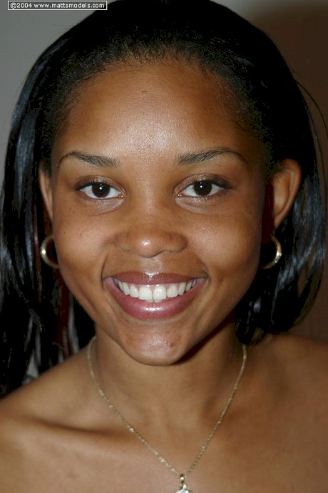 Black girl Cali shows the pink of her pussy after removing her clothes