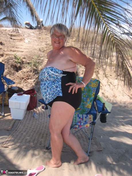 Fat granny Girdle Goddess takes off swimwear to pose nude at the ebach