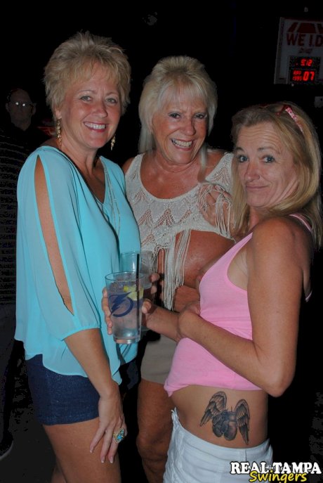 Amateur swinger Tracy Lick and her girls play with horny guys in a night club