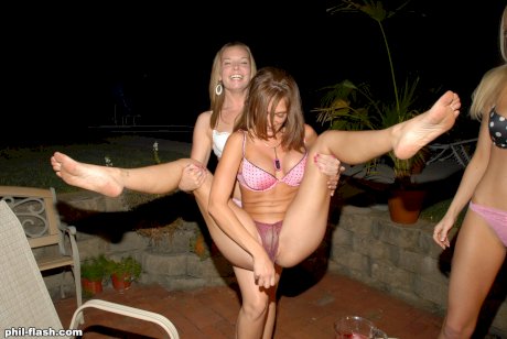 Amateur girls bare their tits while playing a drinking game in their underwear