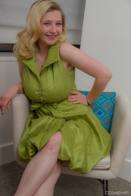 Blonde amateur Mim Turner releases her big natural tits as she removes dress