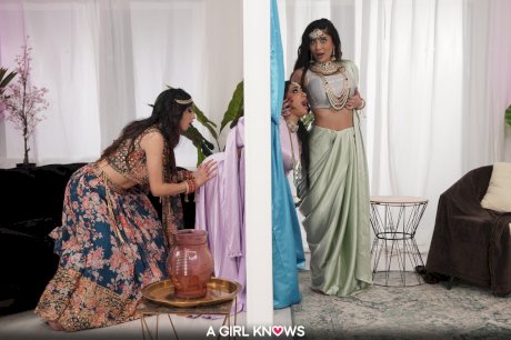 Horny Indian lesbians give each other a pussy licking in a wild threesome