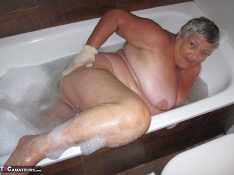 Morbidly obese woman Grandma Libby shaves before taking a bubble bath