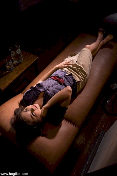 Sexy Asian babe Mai Ly gets bound to a bed and gagged before being tortured
