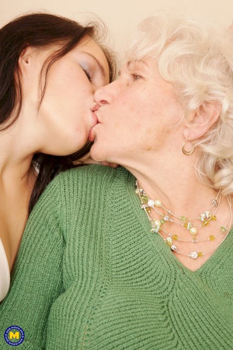 Busty granny receives oral pleasure from two sexy lesbian teens