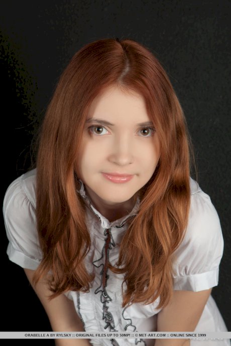 Sweet ginger cutie with a cute butt Orabelle stretches her hairy cunt