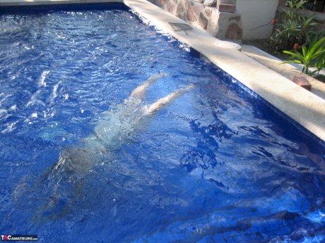 Fat nan Girdle Goddess goes for a skinny dip in a backyard pool