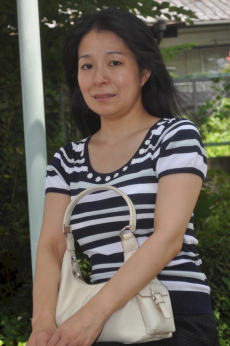 Petite Japanese granny Akiko Oda strips and shows her bushy wet beaver