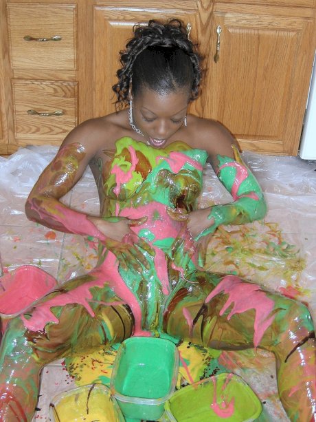 Ebony amateur Anastasia covers her hot body with paint in the kitchen