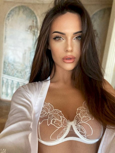 Stunning model Anastasia Vi teases with her perfect big tits & ass in lingerie