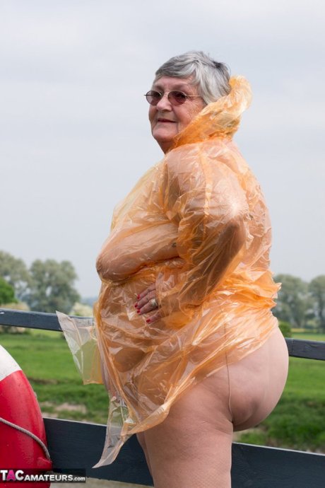 Obese British amateur Grandma Libby casts off a see-through raincoat