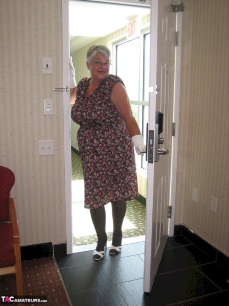 Silver haired nan Girdle Goddess bares her big tits and twat in white gloves