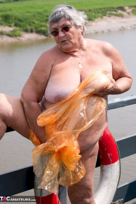 Obese British amateur Grandma Libby casts off a see-through raincoat
