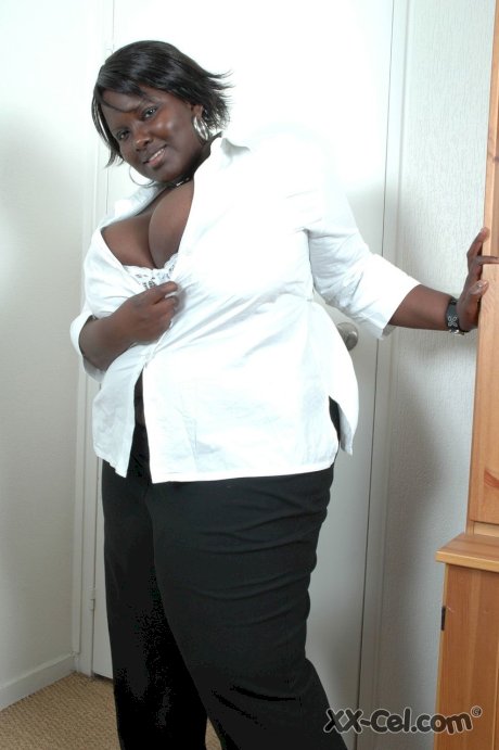 Ebony BBW Mariana Kodjo unleashes her enormous tits and plays with them