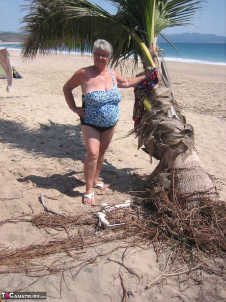 Fat granny Girdle Goddess takes off swimwear to pose nude at the ebach