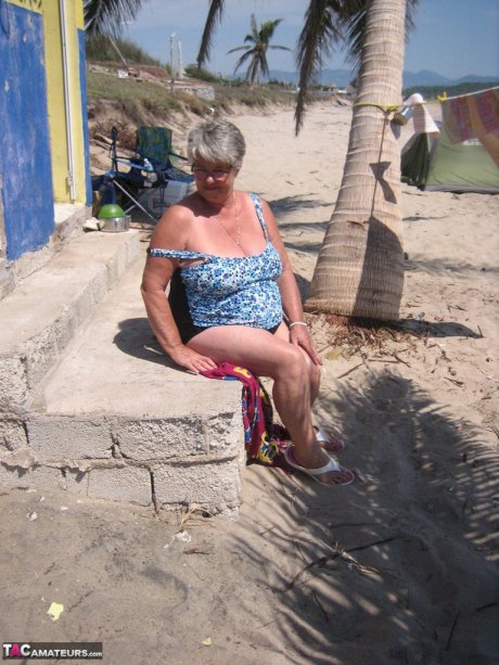 Fat granny Girdle Goddess takes off swimwear to pose nude at the ebach