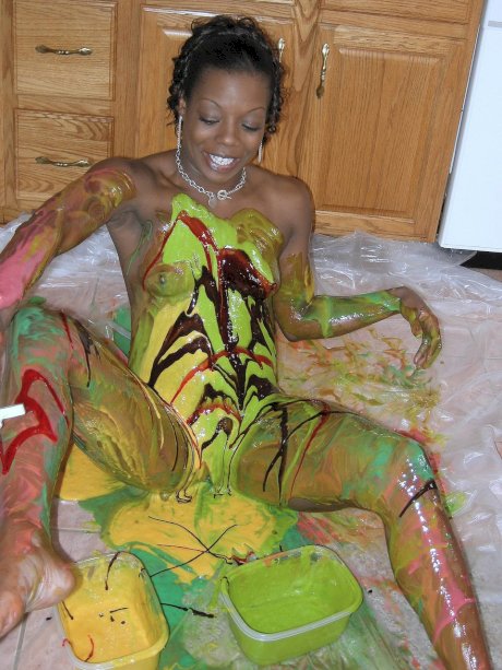 Ebony amateur Anastasia covers her hot body with paint in the kitchen