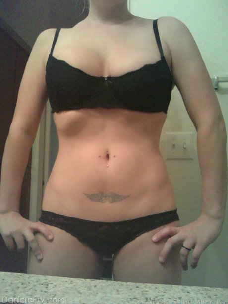 Big titted blonde amateur Danielle takes naughty selfies around the house