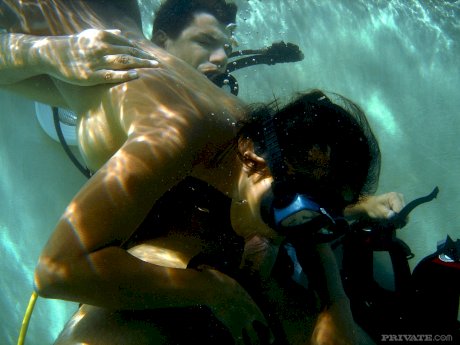 Asian scuba diver gives a BJ underwater before fucking beside pool