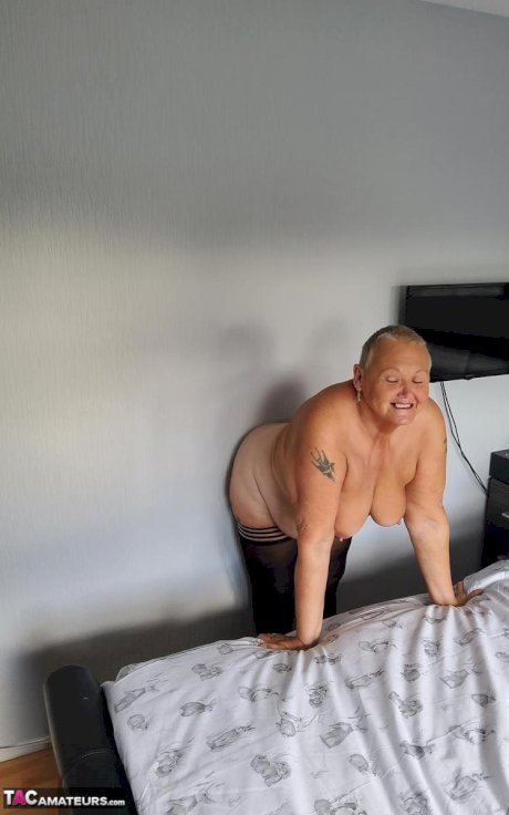 Overweight granny Valgasmic Exposed sheds her lingerie to pose nude in hosiery