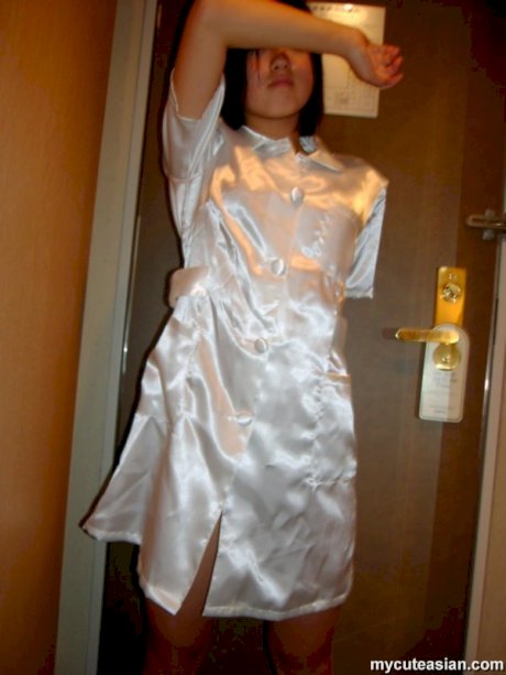 Japanese girl in silk robe gets cum on face after jerking on a cock