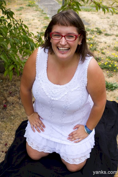 Fat amateur brunette with glasses Betty H shows off her giant tits outdoors