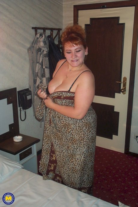 Chubby mature Iris lets out her big tits and takes two hard dicks