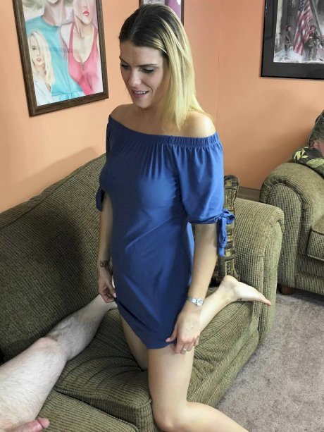Sexy amateur MILF Stevie Rae gives head and doffs her blue dress