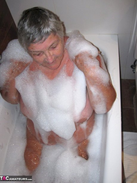 Morbidly obese woman Grandma Libby shaves before taking a bubble bath