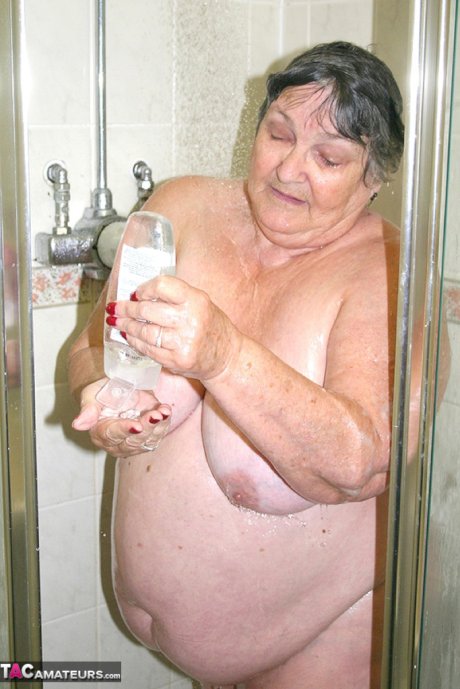 Obese granny Grandma Libby fondles her naked body while taking a shower