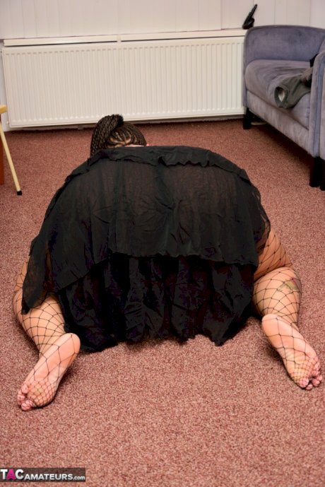 SSBBW wears a mask while unveiling her huge saggy tits and massive ass