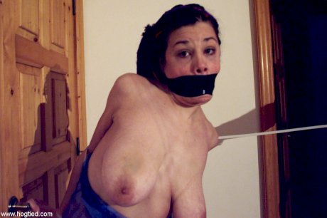 MILF with big boobs gets bound, ball-gagged and groped by her master