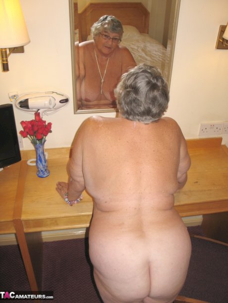Fat British nan Grandma Libby completely disrobes while in a hotel room