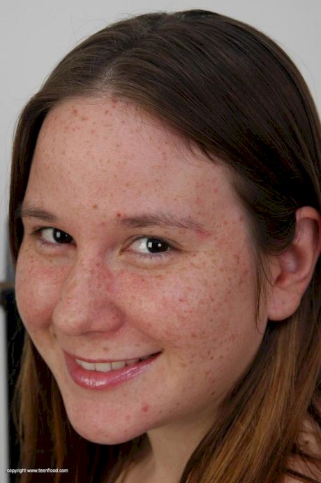 Chubby girl with freckles reveals unshaven pits and pussy on weight bench