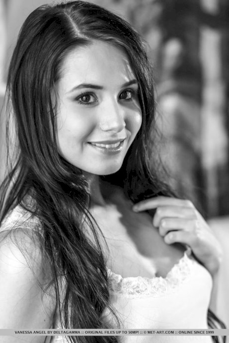 Gorgeous petite playgirl Vanessa Angel fingers her cleanly shaved cunt