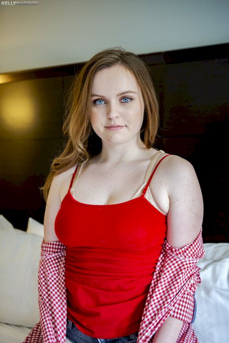Cute brunette teen River Fox disrobes to show her big natural titties