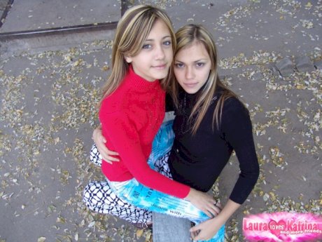Young hot blonde lesbian teens having fun flashing their small tit in the sun