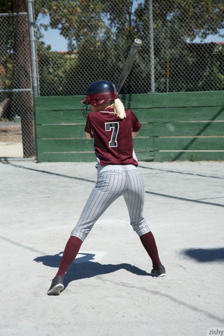 Sporty blonde Morgan Attwood flashing tiny tits & hot ass in a softball field