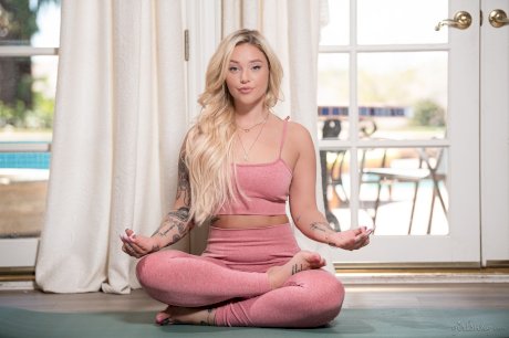 Three big bottomed females do yoga in their workout clothes