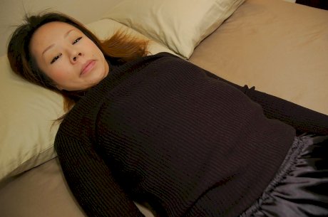 Asian MILF Maki Shimazaki undressing and demonstrating her cunt in close up