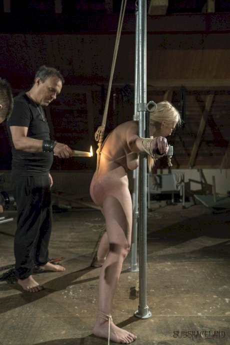 Blond sex slave Roxy Risingstar find herself being tortured while in bondage