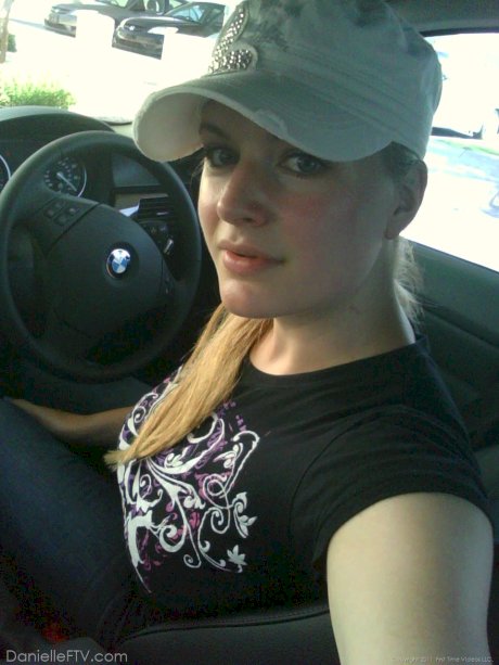 Blonde amateur Danielle takes sexy selfies around her home in a SFW manner