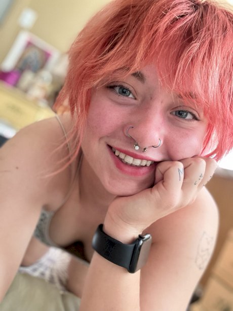 Pink-haired amateur slut Redhead Abby poses dressed up in the mirror