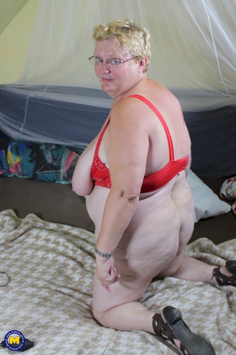 Blonde granny Edeltrud reveals her huge naturals and toys her swollen vagina