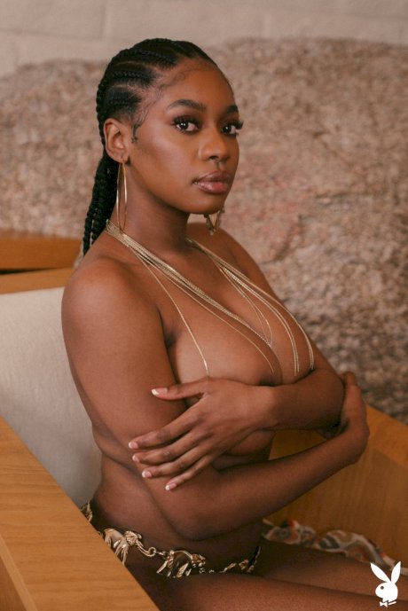 Sexy ebony babe Nyla strips and flaunts her incredible big tits & hairy cunt